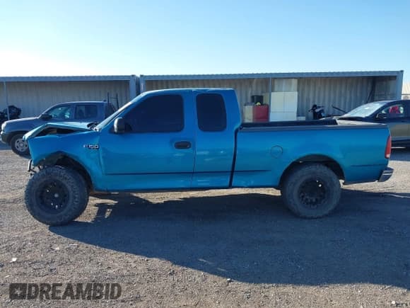 ✅ 1998 Ford F-150 • VIN: 1FTZX1728WKB99618 • Lot: 43518395. Listed on IAAI with Not provided. Free auction sales archive from the USA and detailed vehicle history report at DreamBid. Image 15.