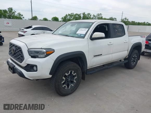 ✅ 2022 Toyota Tacoma SR • VIN: 3TMCZ5AN7NM493268 • Lot: 42041593. Listed on IAAI with 100,589 mi. Free auction sales archive from the USA and detailed vehicle history report at DreamBid. Image 17.