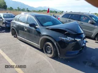 ✅ 2018 Mazda CX-9 Sport • VIN: JM3TCBBY6J0222750 • Lot: 42294464. Listed on IAAI with 63,927 mi. Free auction sales archive from the USA and detailed vehicle history report at DreamBid. Image 1.