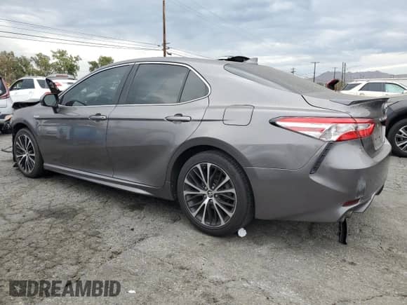 2020 Toyota Camry Hybrid SE с VIN 4T1G31AK2LU519524, выставлен на аукционе Copart как лот 70734245 с пробегом 85 086 миль миль и Списание • Salvage title. История ставок и продаж доступна на DreamBid. Изображение 2.