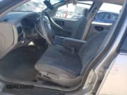 ✅ 1995 Buick Regal Custom • VIN: 2G4WB52LXS1456065 • Lot: 47444325. Wystawiony na Copart z przebiegiem 169 679 mil. Bezpłatny archiwum sprzedaży aukcyjnych z USA i szczegółowy raport historii pojazdu na DreamBid. Zdjęcie 7.