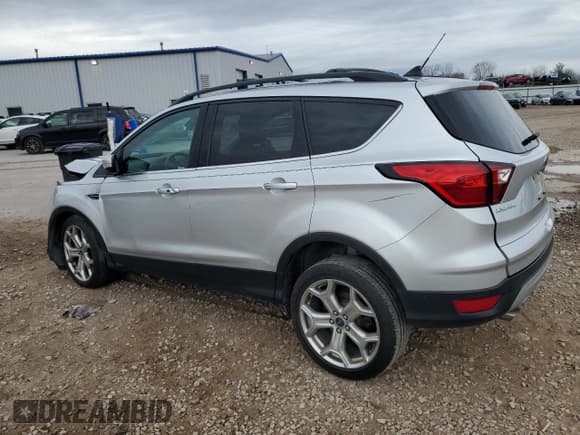 ✅ 2019 Ford Escape Titanium • VIN: 1FMCU9J93KUA49350 • Лот: 91248335. Опубликован ранее на Copart с пробегом 71 226 миль. Бесплатный доступ к архиву аукционных продаж из США и подробный отчёт об истории автомобиля на DreamBid. Изображение 2.