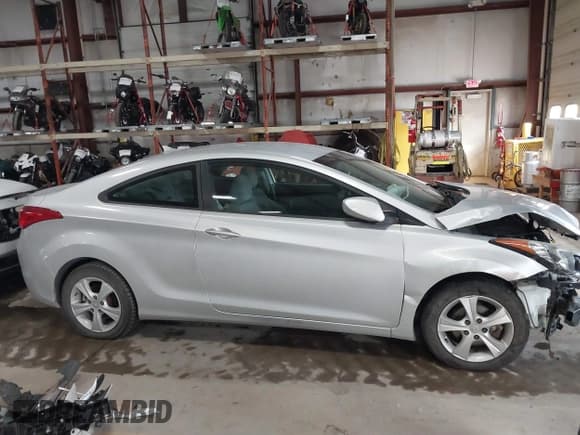 ✅ 2013 Hyundai Elantra GS • VIN: KMHDH6AE6DU005981 • Lot: 41560050. Listed on IAAI with Not provided. Free auction sales archive from the USA and detailed vehicle history report at DreamBid. Image 13.