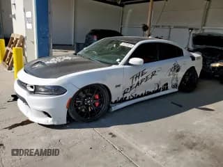 ✅ 2019 Dodge Charger Scat Pack • VIN: 2C3CDXGJ0KH728347 • Лот: 82259615. Опубликован ранее на Copart с пробегом 68 735 миль. Бесплатный доступ к архиву аукционных продаж из США и подробный отчёт об истории автомобиля на DreamBid. Изображение 1.