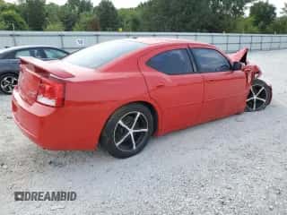 2010 Dodge Charger SXT with VIN 2B3CA3CVXAH228122, listed as a Copart auction lot 63802564 with 198,249 mi miles and Salvage title. Bid and sale history available at DreamBid. Image 3.