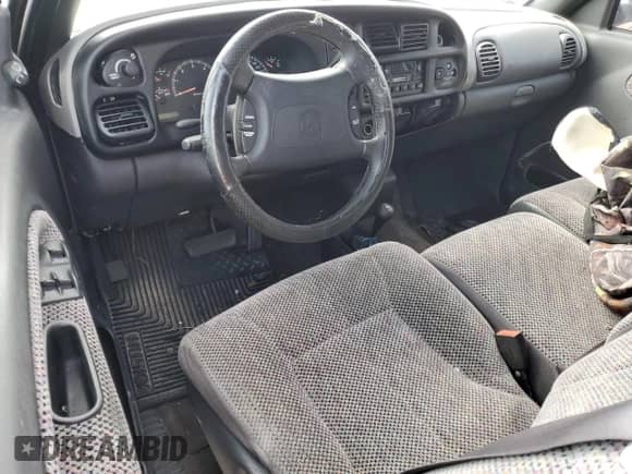 1998 Dodge 1500 z VIN 3B7HF13Y8WG215512, wystawiony jako Copart lot #76803314 z przebiegiem Nie podano mil oraz Szkoda całkowita • Salvage title. Historia ofert i sprzedaży dostępna na DreamBid. Obrazek 8.