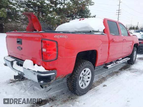 ✅ 2017 Chevrolet Silverado 2500HD LT • VIN: 1GC1KVEG1HF104295 • Lot: 41276100. Listed on IAAI with 65,635 mi. Free auction sales archive from the USA and detailed vehicle history report at DreamBid. Image 4.
