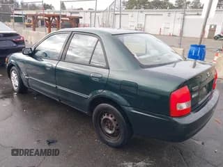 ✅ 2000 Mazda Protege DX • VIN: JM1BJ2222Y0263425 • Лот: 43747638. Опубликован ранее на IAAI с пробегом 144 157 миль. Бесплатный доступ к архиву аукционных продаж из США и подробный отчёт об истории автомобиля на DreamBid. Изображение 3.