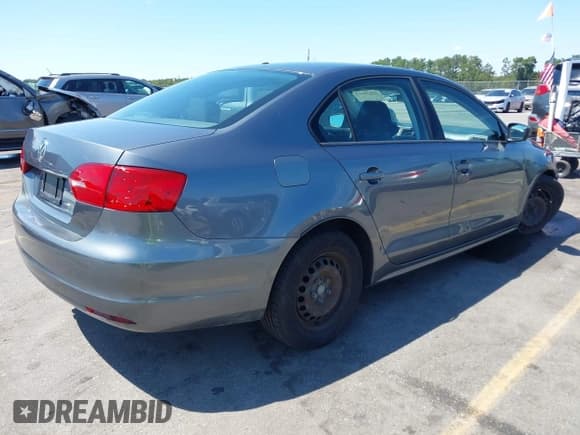 ✅ 2013 Volkswagen Jetta • VIN: 3VW2K7AJ0DM402300 • Lot: 43120113. Listed on IAAI with 136,554 mi. Free auction sales archive from the USA and detailed vehicle history report at DreamBid. Image 4.