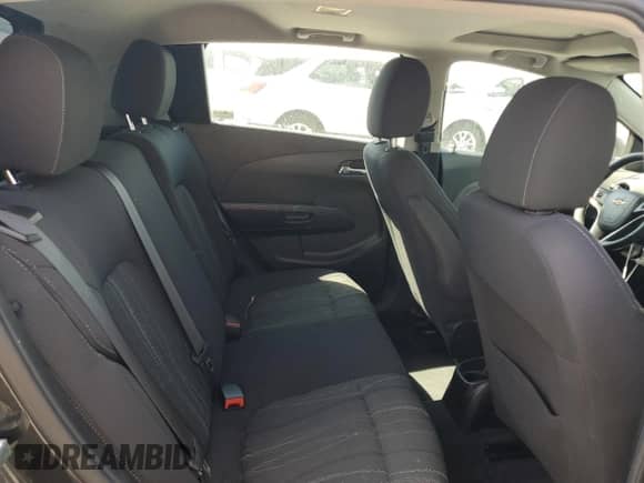 2015 Chevrolet Sonic LT z VIN 1G1JC6SBXF4113932, wystawiony jako Copart lot #80404595 z przebiegiem 69 220 mil mil oraz Szkoda całkowita • Salvage title. Historia ofert i sprzedaży dostępna na DreamBid. Obrazek 10.