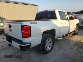 ✅ 2018 Chevrolet Silverado 1500 LT • VIN: 3GCUKREC4JG222167 • Лот: 72323374. Опубликован ранее на Copart с пробегом 70 876 миль. Бесплатный доступ к архиву аукционных продаж из США и подробный отчёт об истории автомобиля на DreamBid. Изображение 3.