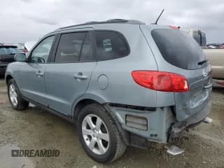 ✅ 2009 Hyundai Santa Fe Limited • VIN: 5NMSH13E39H311854 • Lot: 81787414. Listed on Copart with 153,475 mi. Free auction sales archive from the USA and detailed vehicle history report at DreamBid. Image 2.