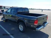 ✅ 2002 Dodge Dakota SLT • VIN: 1B7HG48N82S634864 • Lot: 41839572. Wystawiony na IAAI z przebiegiem 138 557 mil. Bezpłatny archiwum sprzedaży aukcyjnych z USA i szczegółowy raport historii pojazdu na DreamBid. Zdjęcie 3.