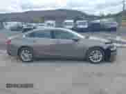 2018 Chevrolet Malibu LT z VIN 1G1ZD5ST2JF111396, wystawiony jako IAAI lot #43515295 z przebiegiem 155 383 mil mil oraz . Historia ofert i sprzedaży dostępna na DreamBid. Obrazek 13.