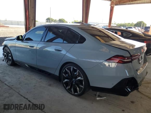 ✅ 2024 BMW i5 eDrive40 • VIN: WBY33FK04RCS32129 • Lot: 84874825. Listed on Copart with 11,356 mi. Free auction sales archive from the USA and detailed vehicle history report at DreamBid. Image 2.