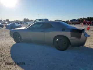 2012 Dodge Challenger SXT z VIN 2C3CDYAG4CH101526, wystawiony jako Copart lot #90643015 z przebiegiem 130 011 mil mil oraz Czysty tytuł • Clean title. Historia ofert i sprzedaży dostępna na DreamBid. Obrazek 2.