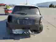 2014 MINI Hardtop S with VIN WMWXM7C59ET987820, listed as a Copart auction lot 59164955 with 77,699 mi miles and Salvage title. Bid and sale history available at DreamBid. Image 6.