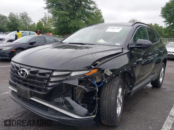 ✅ 2022 Hyundai Tucson SEL • VIN: KM8JBCAE6NU031615 • Lot: 42887395. Listed on IAAI with 63,078 mi. Free auction sales archive from the USA and detailed vehicle history report at DreamBid. Image 17.