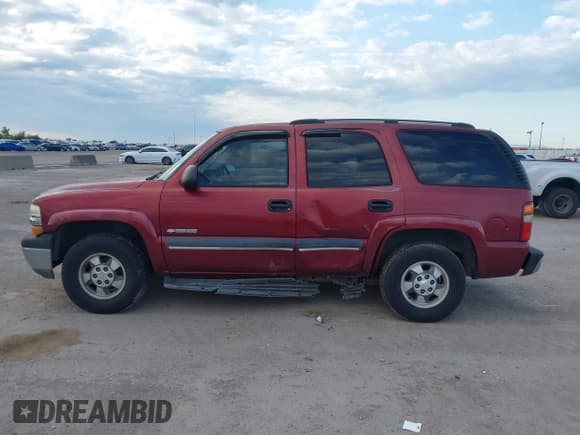 ✅ 2003 Chevrolet Tahoe LS • VIN: 1GNEC13V03R310084 • Lot: 42187078. Listed on IAAI with 217,863 mi. Free auction sales archive from the USA and detailed vehicle history report at DreamBid. Image 14.