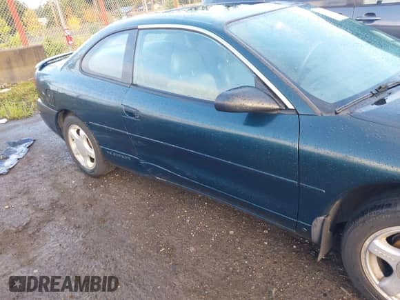 1995 Dodge Avenger z VIN 4B3AU52N9SE215767, wystawiony jako IAAI lot #43494144 z przebiegiem 217 304 mil mil oraz . Historia ofert i sprzedaży dostępna na DreamBid. Obrazek 6.