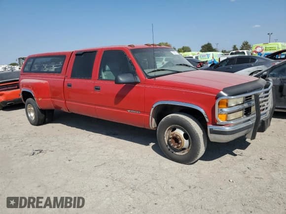 ✅ 1999 Chevrolet Silverado 3500 • VIN: 1GCHC33J3XF055520 • Лот: 71958374. Опубликован ранее на Copart с пробегом 242 976 миль. Бесплатный доступ к архиву аукционных продаж из США и подробный отчёт об истории автомобиля на DreamBid. Изображение 4.