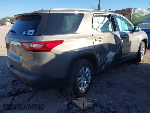 ✅ 2018 Chevrolet Traverse LT Cloth • VIN: 1GNERGKW7JJ137557 • Lot: 43587309. Wystawiony na IAAI z przebiegiem 94 684 mil. Bezpłatny archiwum sprzedaży aukcyjnych z USA i szczegółowy raport historii pojazdu na DreamBid. Zdjęcie 4.