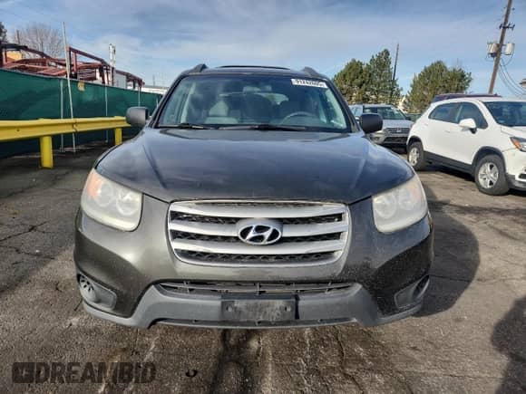 2012 Hyundai Santa Fe GLS с VIN 5XYZGDAB4CG139105, выставлен на аукционе Copart как лот 91242605 с пробегом 157 845 миль миль и Чистый • Clean title. История ставок и продаж доступна на DreamBid. Изображение 5.