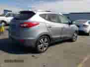 2015 Hyundai Tucson SE z VIN KM8JU3AG7FU098981, wystawiony jako Copart lot #71804224 z przebiegiem 179 496 mil mil oraz Czysty tytuł • Clean title. Historia ofert i sprzedaży dostępna na DreamBid. Obrazek 3.