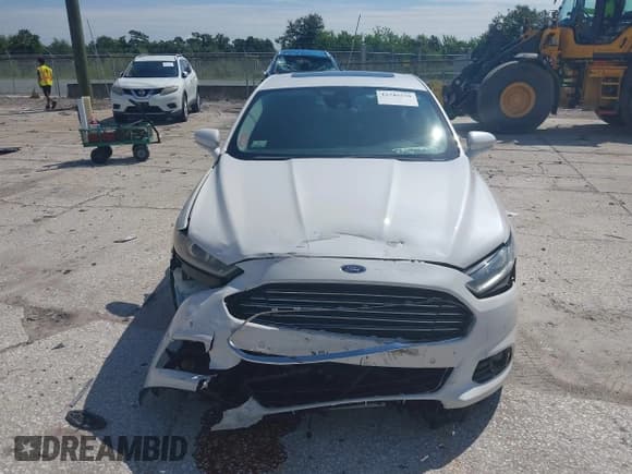 ✅ 2013 Ford Fusion Titanium • VIN: 3FA6P0SU0DR239890 • Lot: 42745530. Wystawiony na IAAI z przebiegiem 129 458 mil. Bezpłatny archiwum sprzedaży aukcyjnych z USA i szczegółowy raport historii pojazdu na DreamBid. Zdjęcie 12.