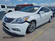 ✅ 2014 Hyundai Azera Limited • VIN: KMHFH4JG1EA379285 • Lot: 42897559. Listed on IAAI with 66,862 mi. Free auction sales archive from the USA and detailed vehicle history report at DreamBid. Image 18.