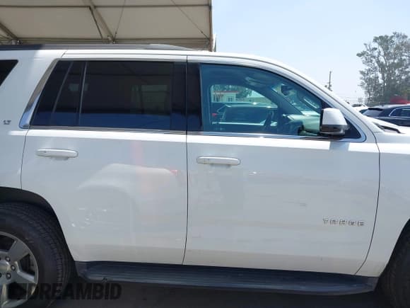 ✅ 2018 Chevrolet Tahoe LT • VIN: 1GNSCBKC9JR283974 • Lot: 42447701. Listed on IAAI with 190,759 mi. Free auction sales archive from the USA and detailed vehicle history report at DreamBid. Image 14.