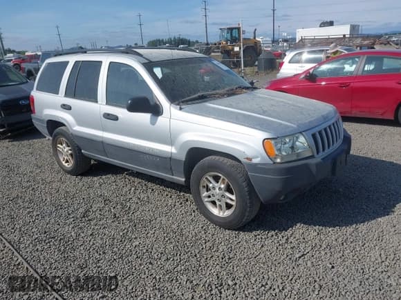 ✅ 2004 Jeep Grand Cherokee Laredo • VIN: 1J4GW48S34C272700 • Lot: 42494918. Listed on IAAI with 214,843 mi. Free auction sales archive from the USA and detailed vehicle history report at DreamBid. Image 1.