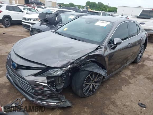 2022 Toyota Camry Hybrid XLE with VIN 4T1F31AK0NU589375, listed as a IAAI auction lot 42600441 with 28,781 mi miles and . Bid and sale history available at DreamBid. Image 18.