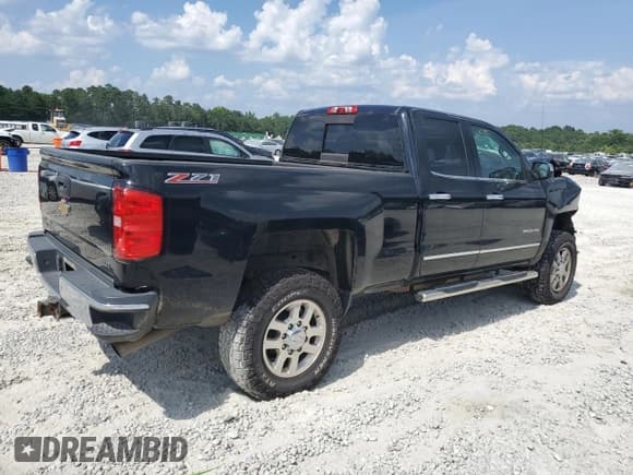 ✅ 2015 Chevrolet Silverado 1500 • VIN: 1GC2CWEG8FZ556585 • Лот: 63701795. Опубликован ранее на Copart с пробегом 126 164 миль. Бесплатный доступ к архиву аукционных продаж из США и подробный отчёт об истории автомобиля на DreamBid. Изображение 3.