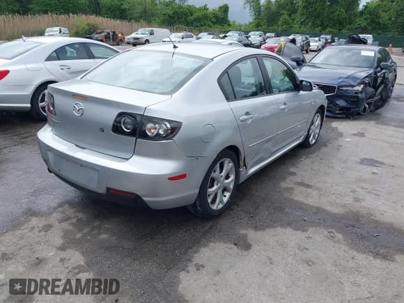 ✅ 2007 Mazda 3 S Touring • VIN: JM1BK323771751838 • Lot: 42160890. Listed on IAAI with 198,798 mi. Free auction sales archive from the USA and detailed vehicle history report at DreamBid. Image 4.