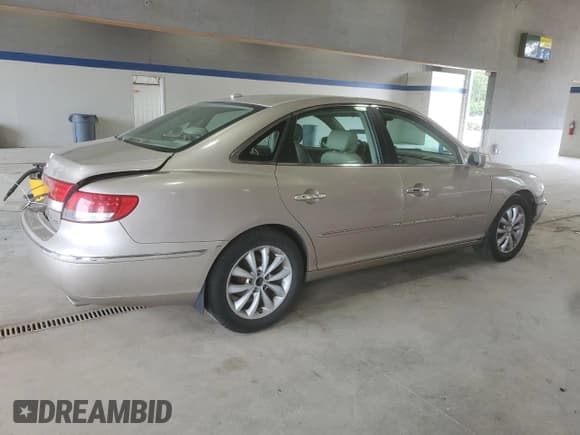 ✅ 2007 Hyundai Azera SE • VIN: KMHFC46F67A240688 • Lot: 58366345. Listed on Copart with 261,260 mi. Free auction sales archive from the USA and detailed vehicle history report at DreamBid. Image 3.