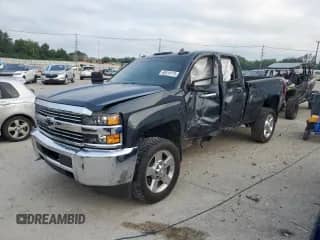 2017 Chevrolet Silverado 2500HD Work Truck with VIN 1GC2KUEG1HZ188311, listed as a Copart auction lot 66514175 with 86,078 mi miles and Salvage title. Bid and sale history available at DreamBid. Image 1.