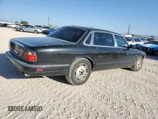 ✅ 1997 Jaguar XJ • VIN: SAJHX6245VC791604 • Лот: 70238764. Опубликован ранее на Copart с пробегом 138 147 миль. Бесплатный доступ к архиву аукционных продаж из США и подробный отчёт об истории автомобиля на DreamBid. Изображение 3.