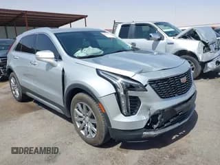 ✅ 2021 Cadillac XT4 FWD Premium Luxury • VIN: 1GYFZCR42MF005253 • Лот: 40470700. Опубликован ранее на IAAI с пробегом 70 571 миль. Бесплатный доступ к архиву аукционных продаж из США и подробный отчёт об истории автомобиля на DreamBid. Изображение 1.