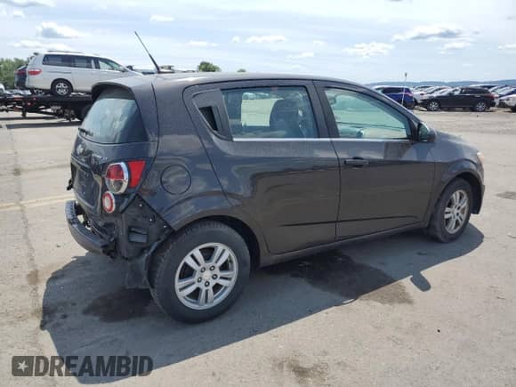 ✅ 2014 Chevrolet Sonic LT • VIN: 1G1JC6SGXE4234261 • Лот: 60103054. Размещён на Copart с пробегом 165 944 миль миль. Получите бесплатный доступ к архиву аукционных продаж из США и посмотрите подробный отчёт об истории автомобиля на DreamBid. Изображение 3.