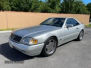 ✅ 1997 Mercedes-Benz SL • VIN: WDBFA76F9VF144872 • Lot: 89713215. Listed on Copart with 90,999 mi. Free auction sales archive from the USA and detailed vehicle history report at DreamBid. Image 2.