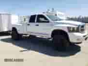 2006 Dodge 3500 Laramie with VIN 3D3MX48C46G261422, listed as a Copart auction lot 55848465 with 135,920 mi miles and Salvage title. Bid and sale history available at DreamBid. Image 4.