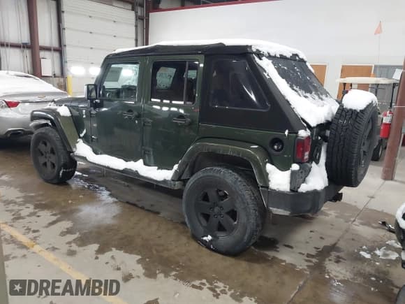 ✅ 2008 Jeep Wrangler Unlimited Sahara • VIN: 1J4GA59168L636589 • Lot: 43858096. Listed on IAAI with 167,313 mi. Free auction sales archive from the USA and detailed vehicle history report at DreamBid. Image 3.