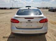 ✅ 2017 Ford Focus Titanium • VIN: 1FADP3J20HL288181 • Лот: 80854745. Опубликован ранее на Copart с пробегом 151 194 миль. Бесплатный доступ к архиву аукционных продаж из США и подробный отчёт об истории автомобиля на DreamBid. Изображение 6.