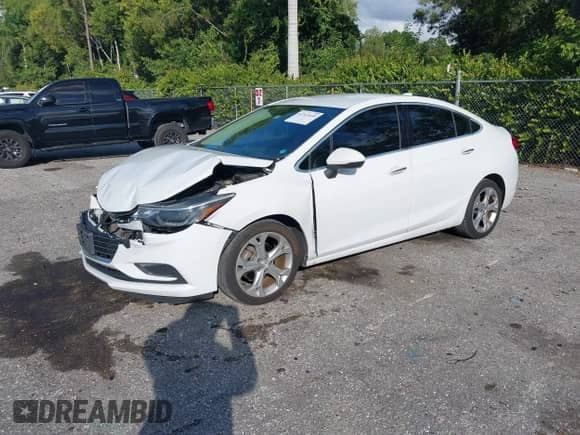 2017 Chevrolet Cruze Premier z VIN 1G1BF5SM8H7267631, wystawiony jako IAAI lot #43521640 z przebiegiem 111 180 mil mil oraz . Historia ofert i sprzedaży dostępna na DreamBid. Obrazek 17.