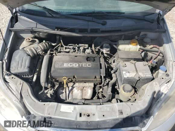 2011 Chevrolet Aveo 1LT z VIN KL1TD6DEXBB140484, wystawiony jako Copart lot #71553954 z przebiegiem 112 583 mil mil oraz Szkoda całkowita • Salvage title. Historia ofert i sprzedaży dostępna na DreamBid. Obrazek 11.