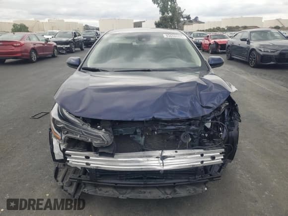 ✅ 2022 Toyota Corolla Hybrid LE • VIN: JTDEAMDE2NJ060329 • Lot: 93658555. Wystawiony na Copart z przebiegiem 65 608 mil. Bezpłatny archiwum sprzedaży aukcyjnych z USA i szczegółowy raport historii pojazdu na DreamBid. Zdjęcie 5.