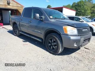 ✅ 2015 Nissan Titan SV • VIN: 1N6AA0EC3FN506967 • Lot: 43060044. Listed on IAAI with 99,062 mi. Free auction sales archive from the USA and detailed vehicle history report at DreamBid. Image 1.