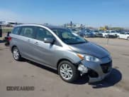 ✅ 2015 Mazda 5 Sport • VIN: JM1CW2BL8F0190878 • Lot: 42163330. Listed on IAAI with 50,237 mi. Free auction sales archive from the USA and detailed vehicle history report at DreamBid. Image 1.
