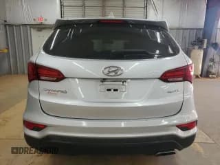 ✅ 2017 Hyundai Santa Fe 2.4L • VIN: 5XYZT3LB1HG434348 • Лот: 91143805. Опубликован ранее на Copart с пробегом 148 430 миль. Бесплатный доступ к архиву аукционных продаж из США и подробный отчёт об истории автомобиля на DreamBid. Изображение 6.